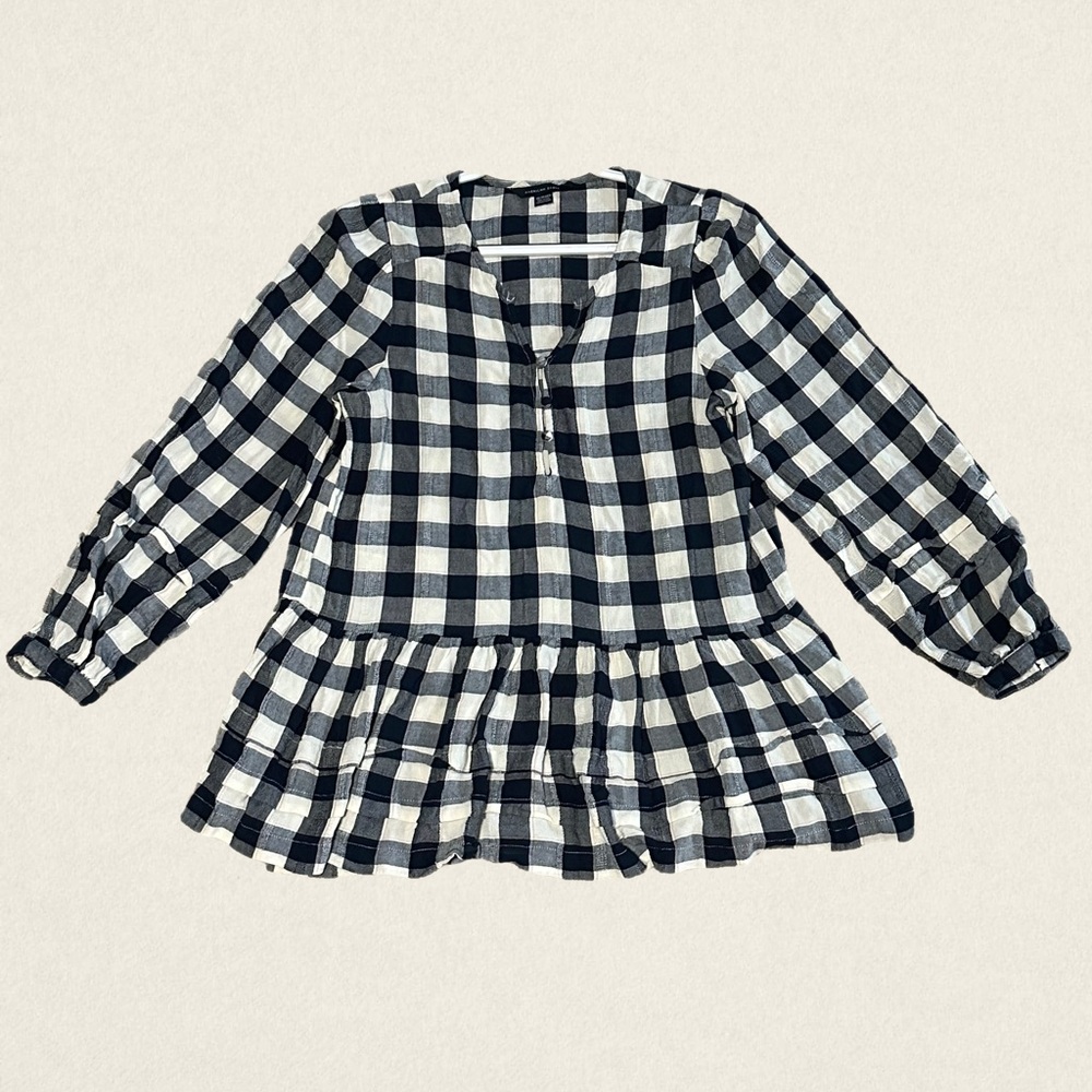 American Eagle navy blue and white gingham long sleeve blouse with ruffle hem.